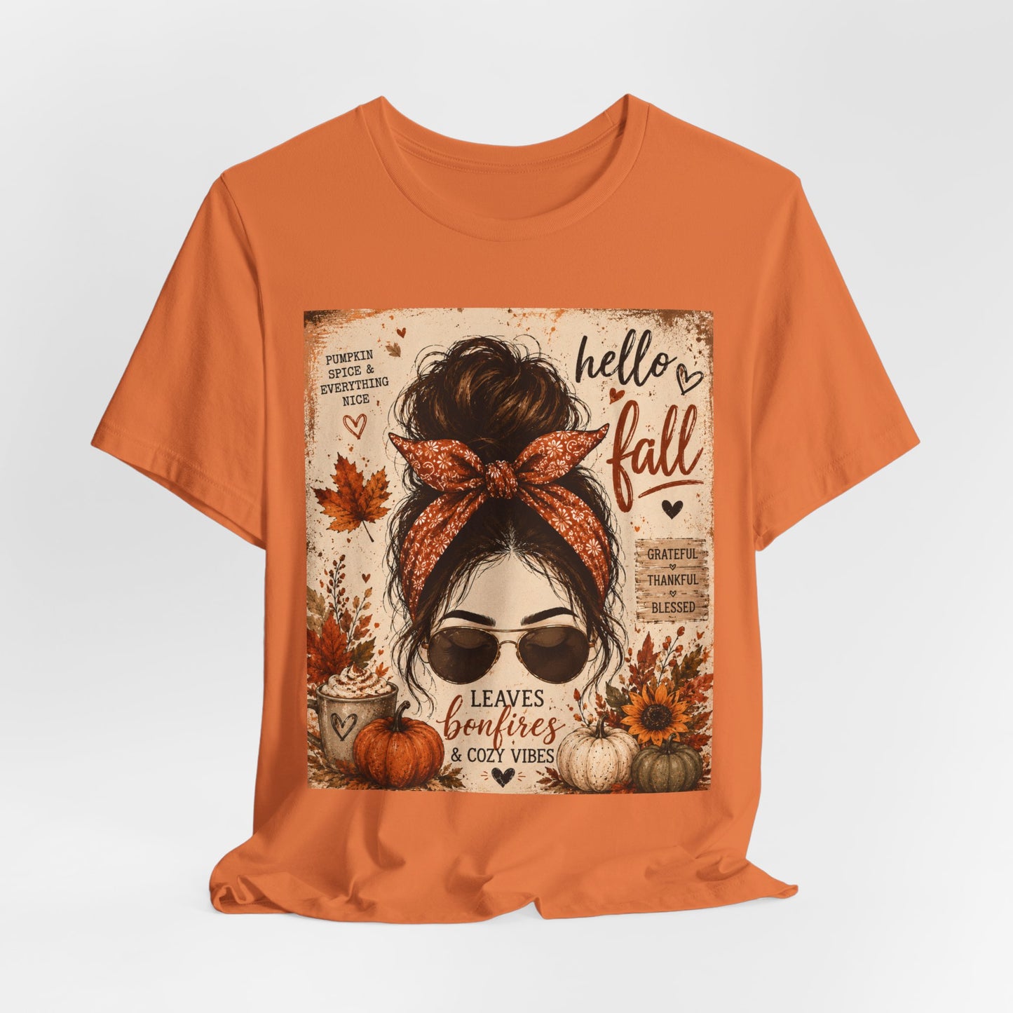 Sunflower Porch Co Hello Fall messy bun graphic Tee | Pumpkin leaves sunflower autumn design